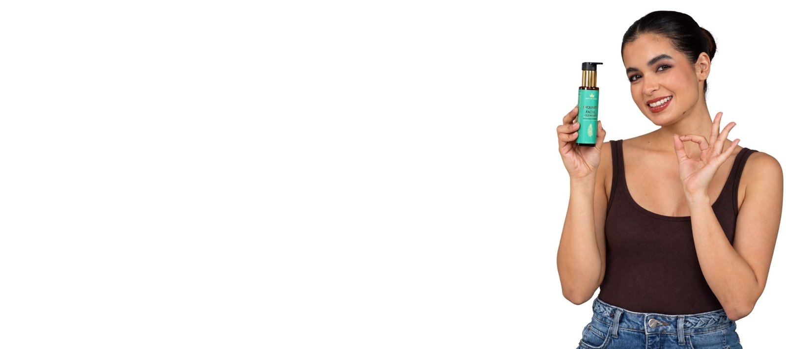 Model holding Nature Sage Exquisite Facial Cleanser